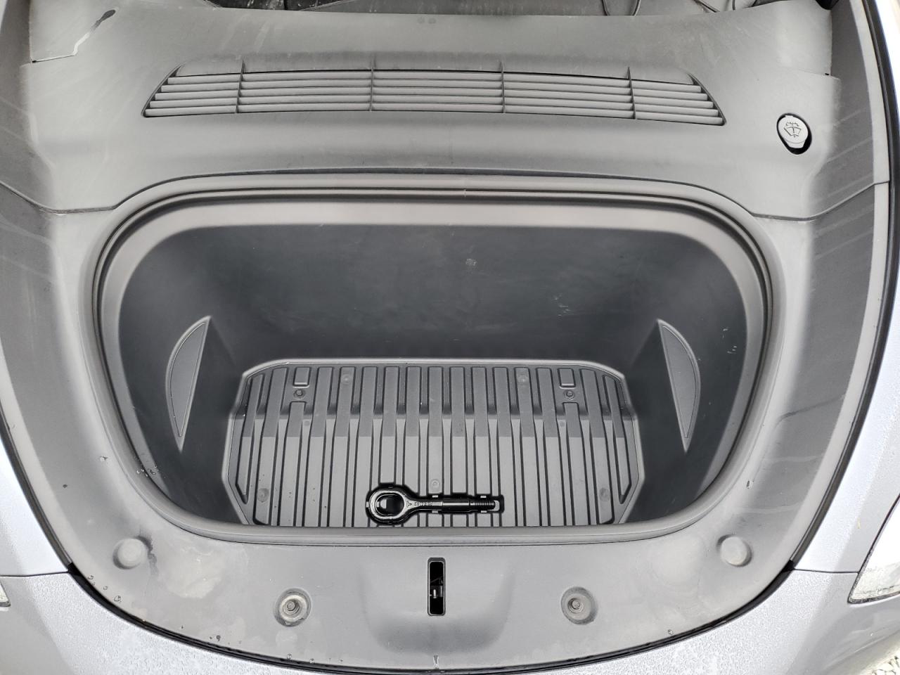 2023 Tesla Model Y VIN: 7SAYGDEE9PA208786 Lot: 82042775