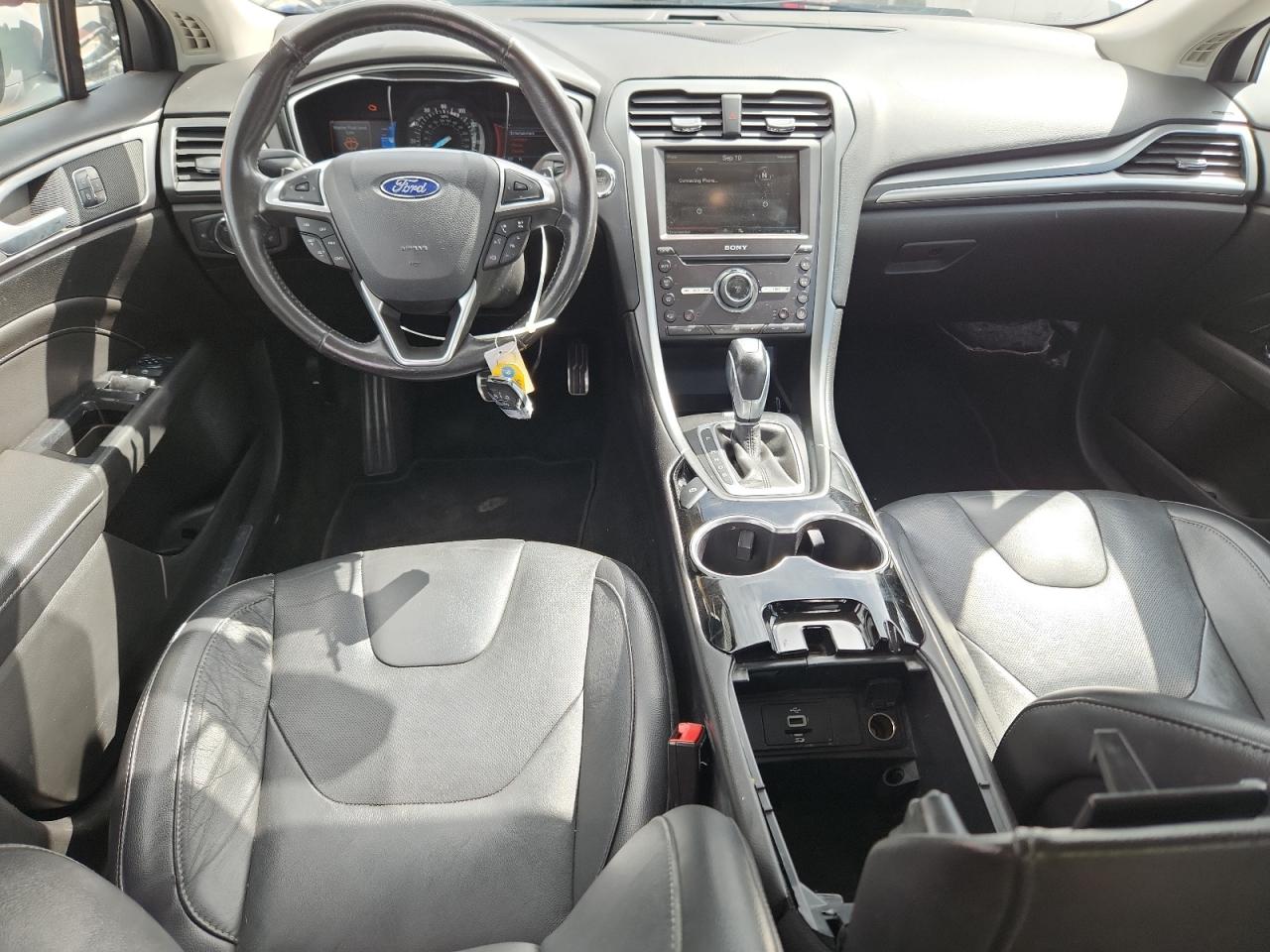 2016 Ford Fusion Titanium VIN: 3FA6P0K96GR331117 Lot: 80106575