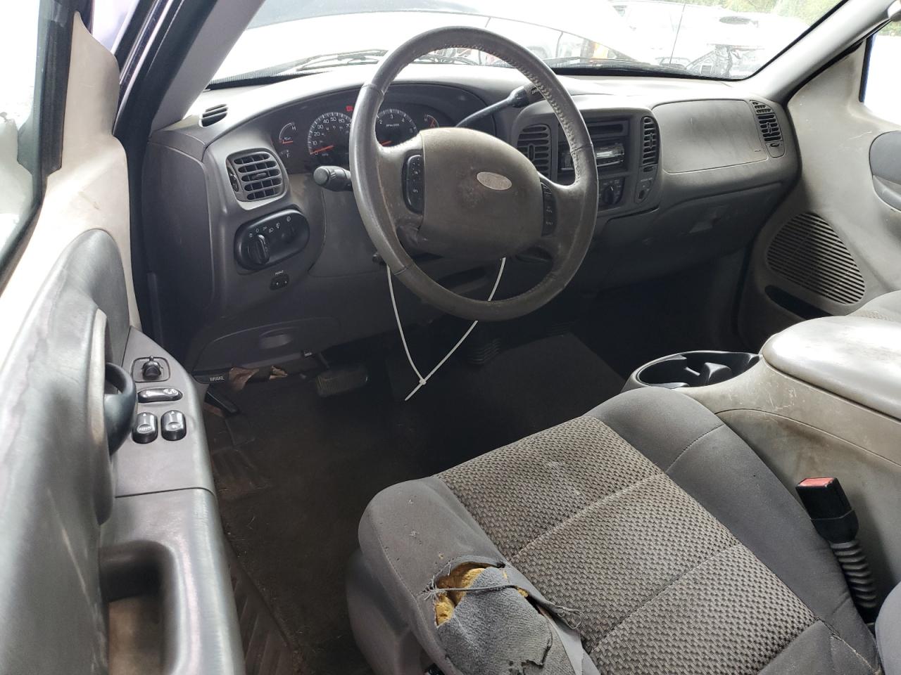 2003 Ford F150 VIN: 2FTRX17203CA61104 Lot: 83854135