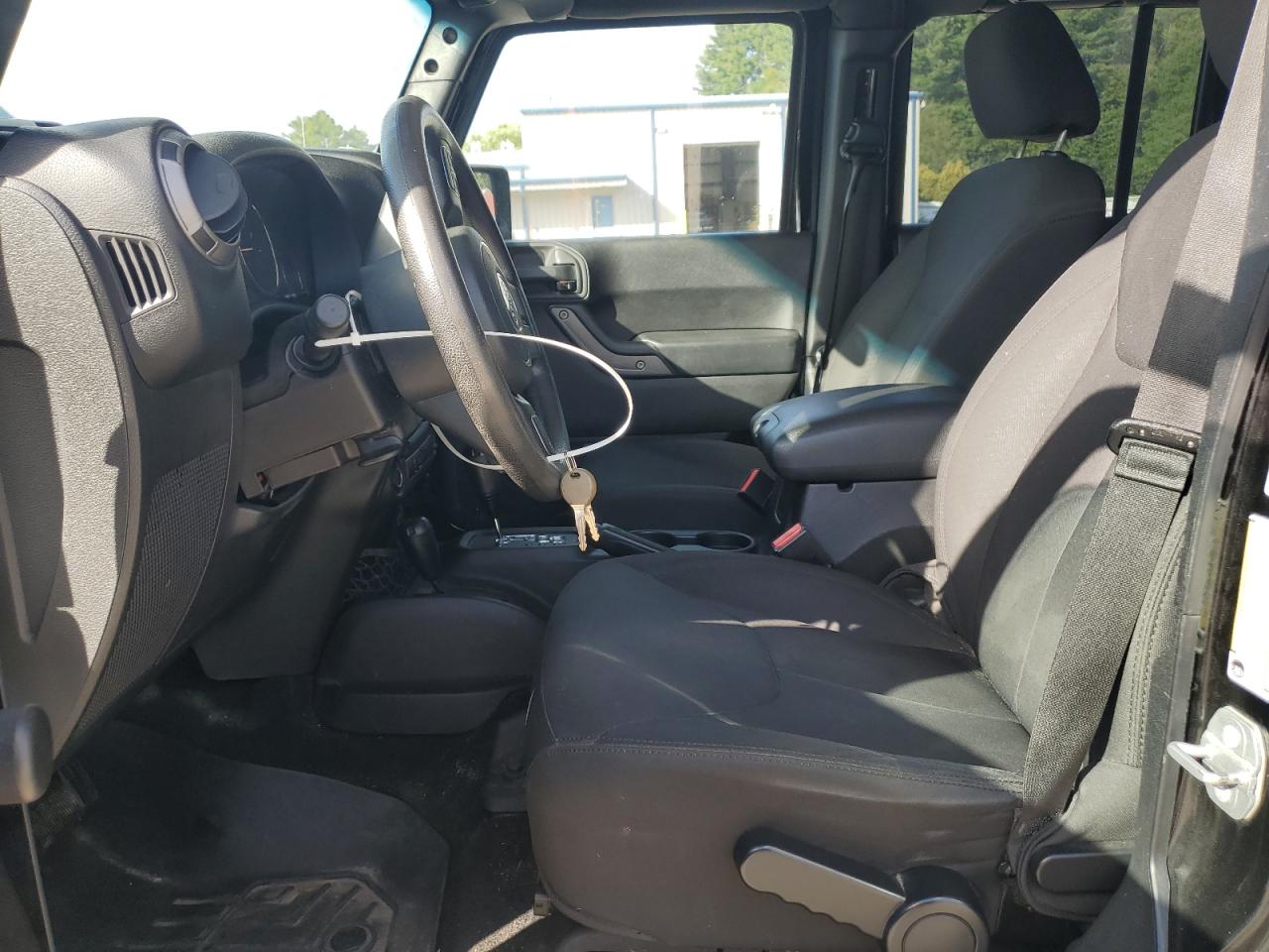 2015 Jeep Wrangler Unlimited Sport VIN: 1C4BJWDG5FL768242 Lot: 80143645