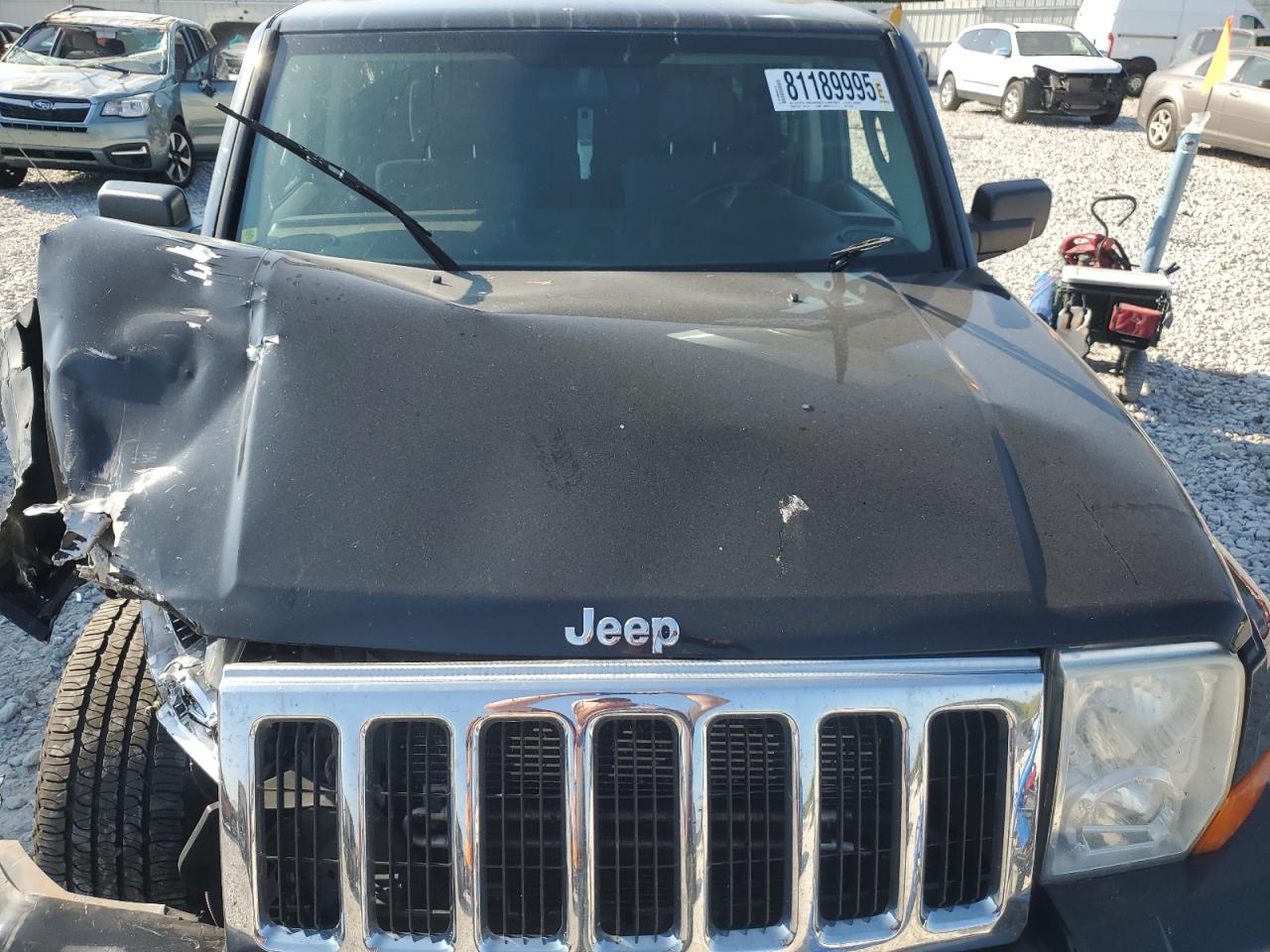 2007 Jeep Commander VIN: 1J8HG48P07C702229 Lot: 81189995