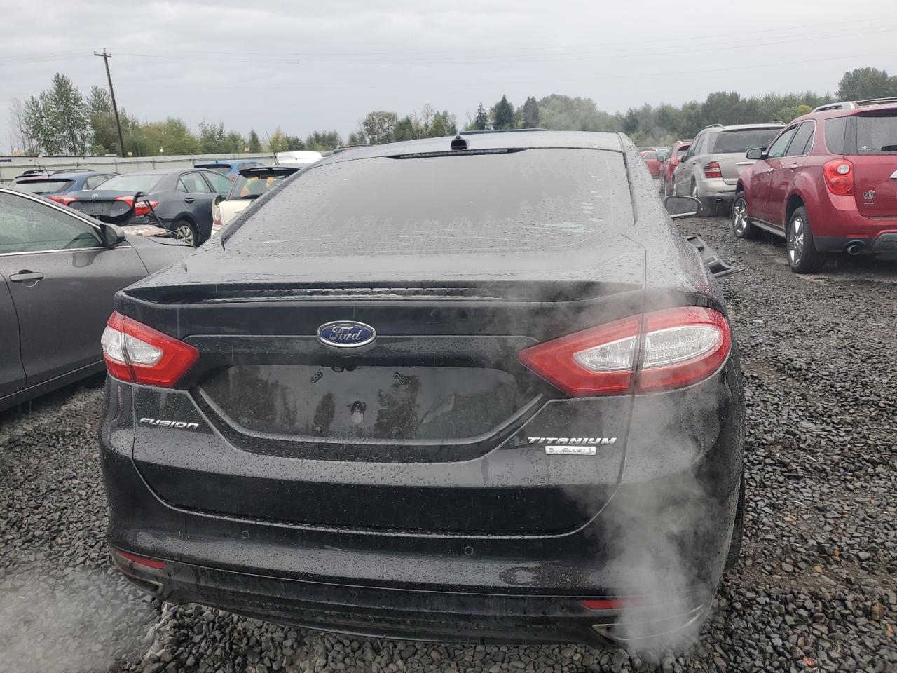 2014 Ford Fusion Titanium VIN: 3FA6P0K95ER270372 Lot: 84543095