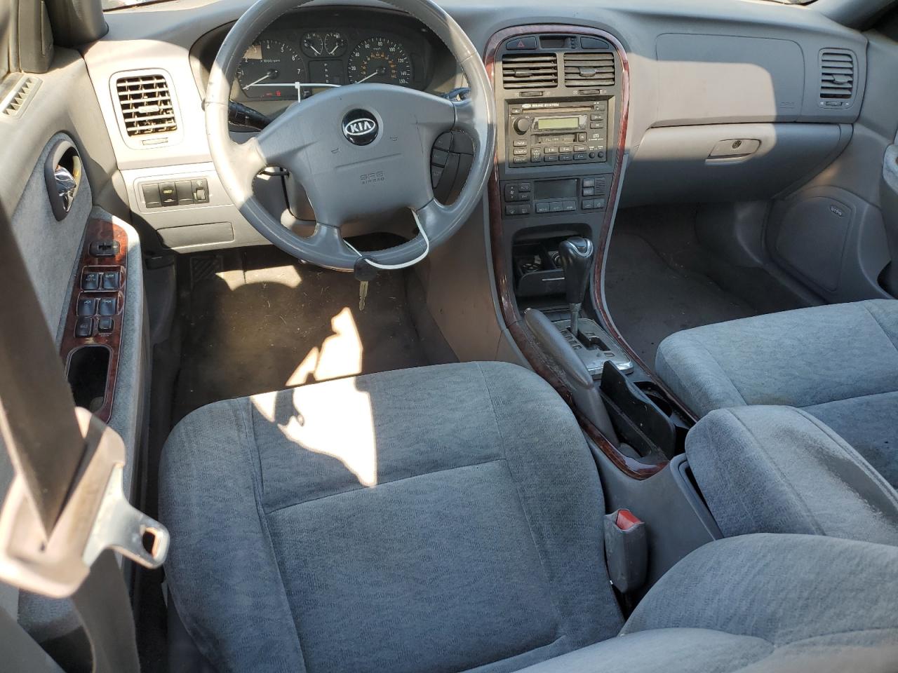 2004 Kia Optima Lx VIN: KNAGD128X45371409 Lot: 82149775