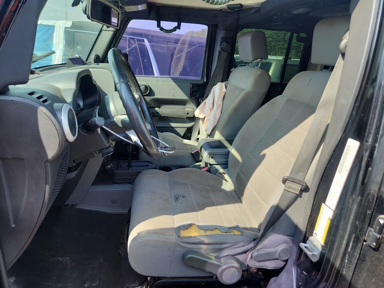 2009 Jeep Wrangler Unlimited Sahara VIN: 1J8GA59119L748734 Lot: 71823575