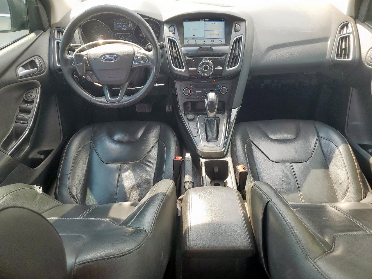 2018 Ford Focus Titanium VIN: 1FADP3N23JL232915 Lot: 72016015