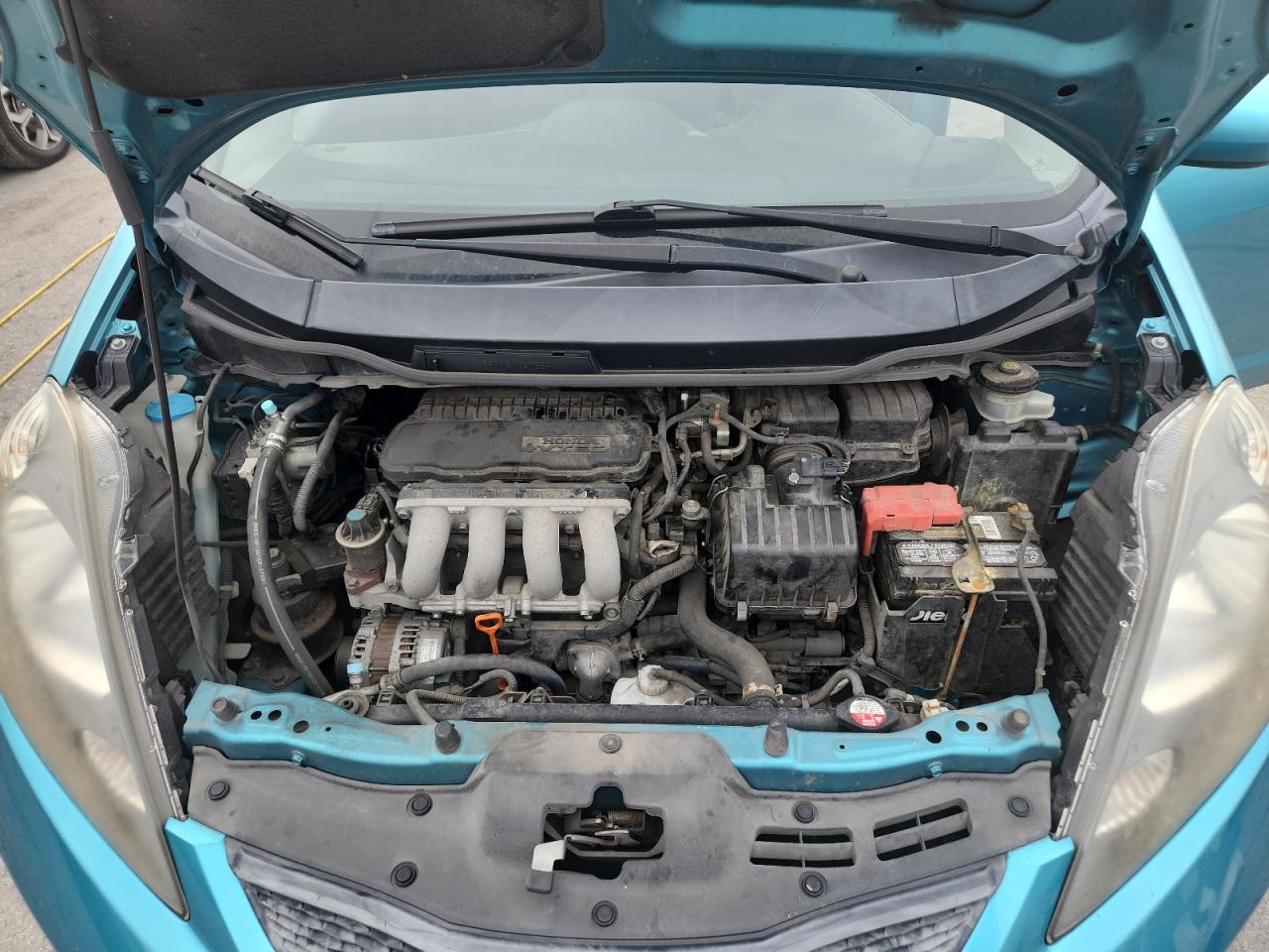 2012 Honda Fit VIN: JHMGE8H36CC006593 Lot: 81558475