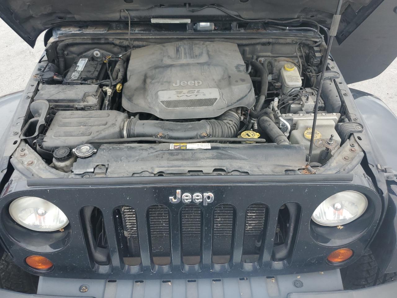 2012 Jeep Wrangler Unlimited Sahara VIN: 1C4BJWEG1CL179988 Lot: 83803925