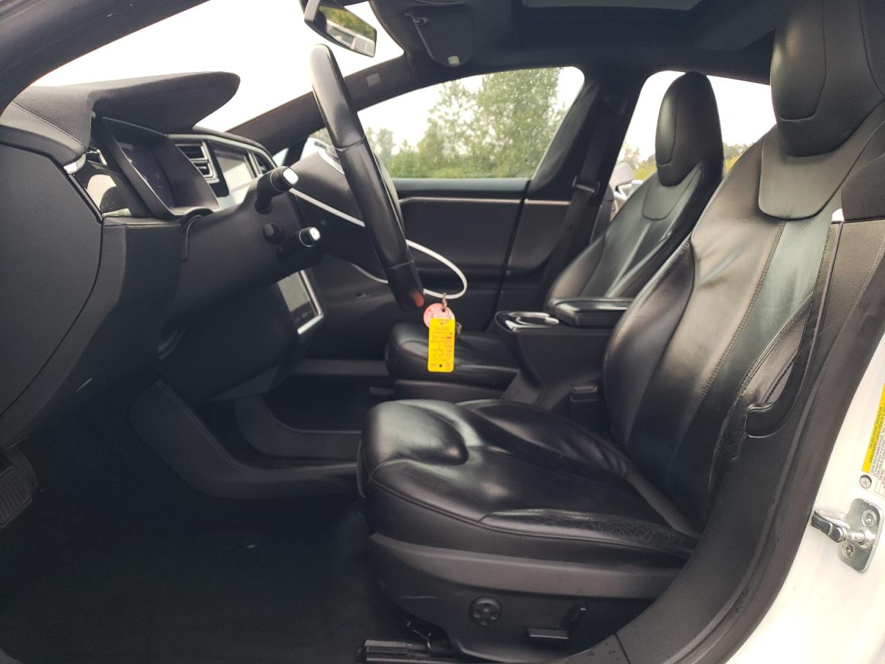 2015 Tesla Model S VIN: 5YJSA1E10FF104415 Lot: 71887835