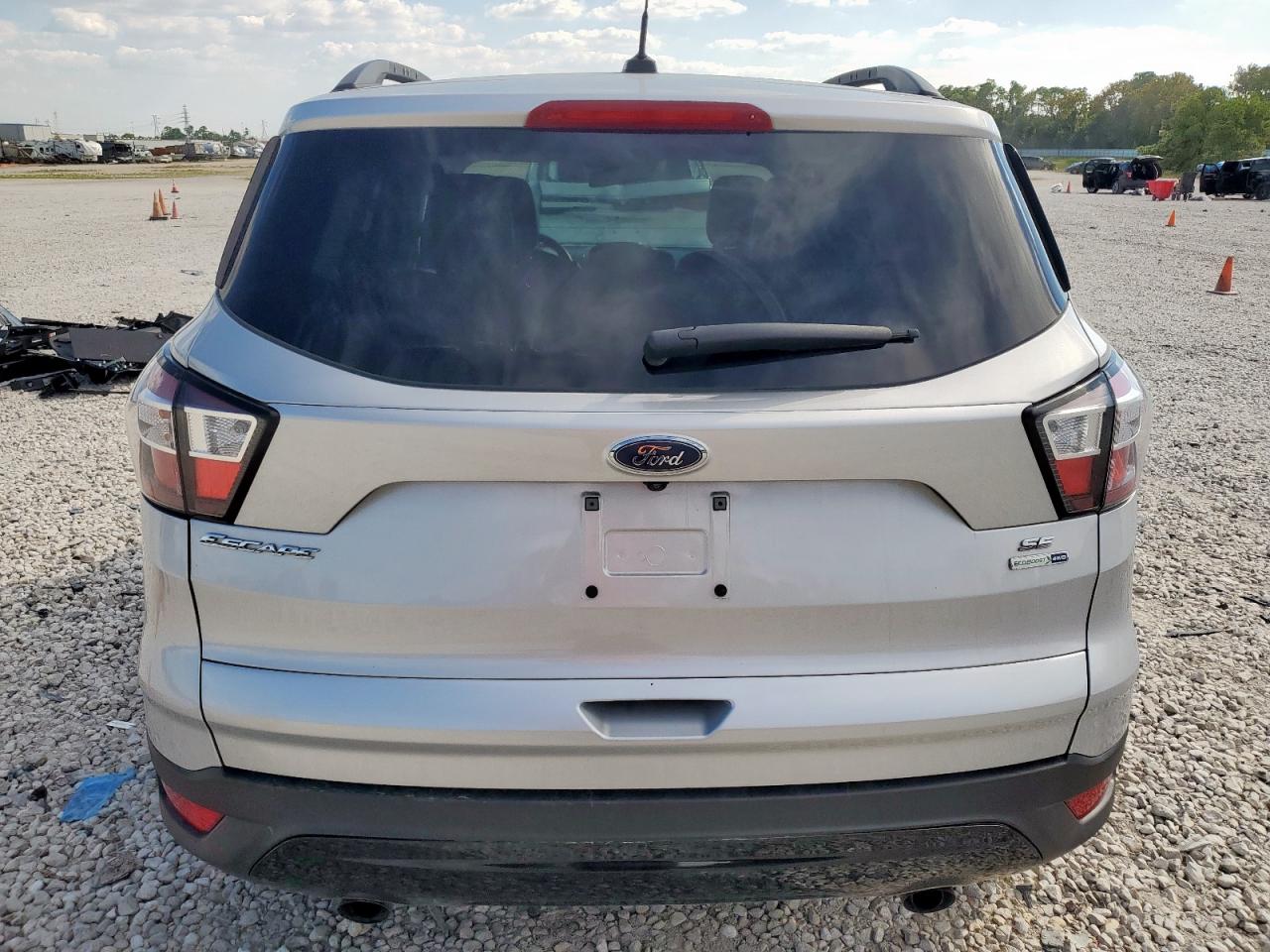 2018 Ford Escape Se VIN: 1FMCU9GD5JUD05272 Lot: 82118625