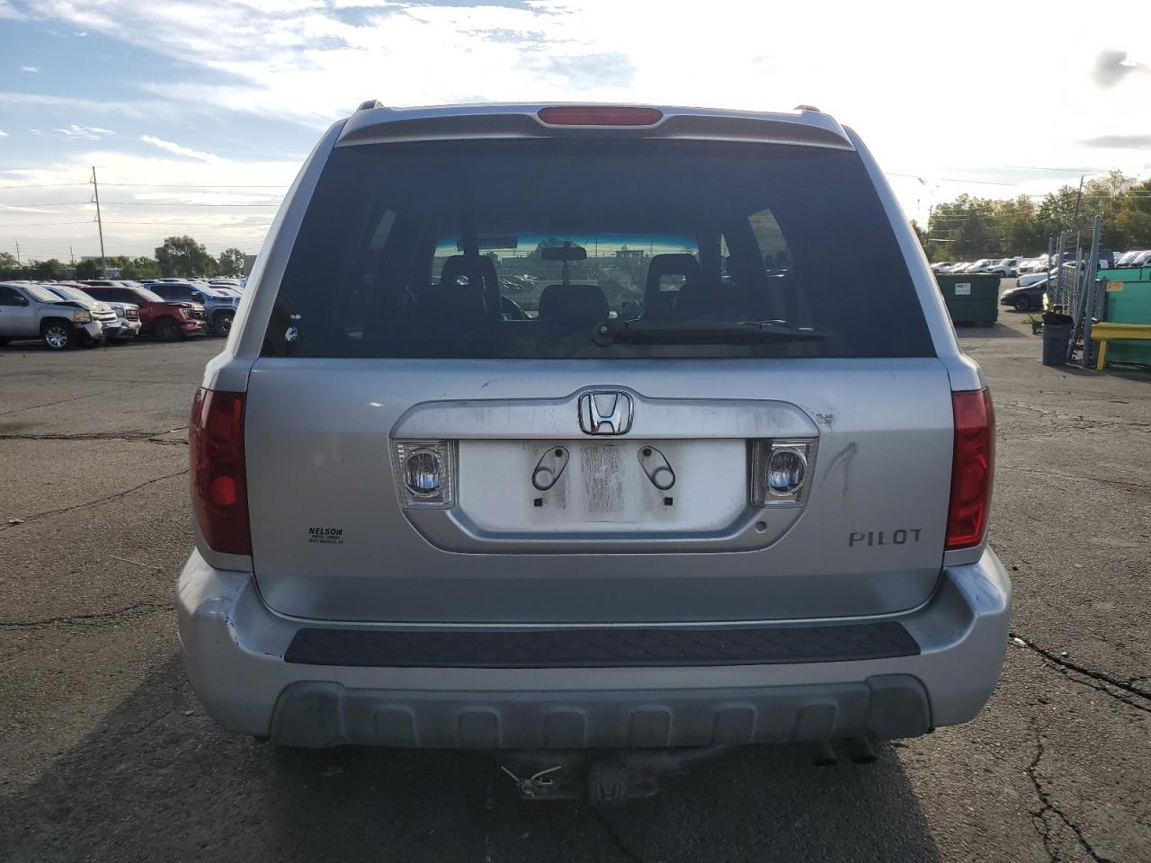 2004 Honda Pilot Exl VIN: 2HKYF18564H596859 Lot: 80671195