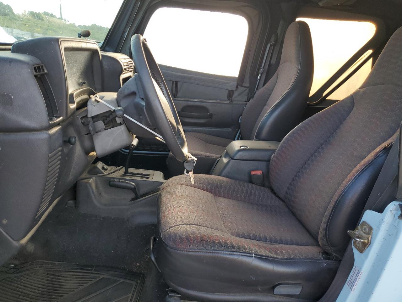 2000 Jeep Wrangler / Tj Sport VIN: 1J4FA49S9YP761383 Lot: 82173305