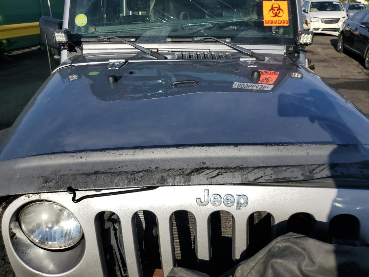 2013 Jeep Wrangler Sport VIN: 1C4AJWAGXDL616826 Lot: 80956435