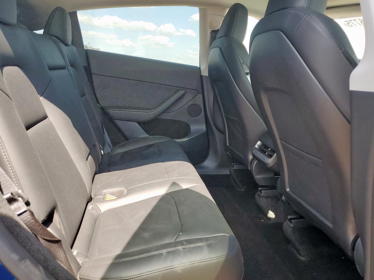 2023 Tesla Model Y VIN: 7SAYGDEE4PA080165 Lot: 80208775