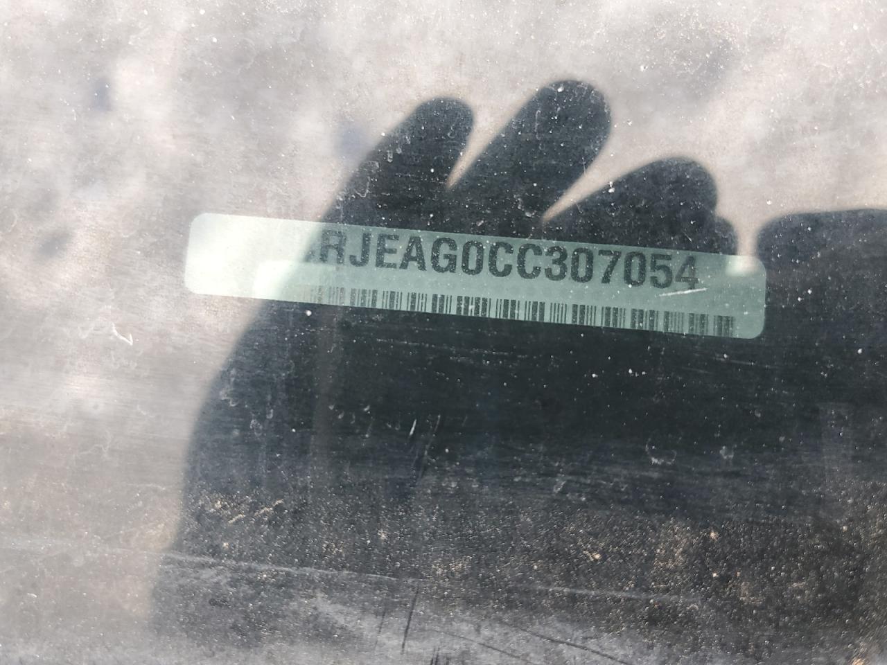 2012 Jeep Grand Cherokee Laredo VIN: 1C4RJEAG0CC307054 Lot: 81123575