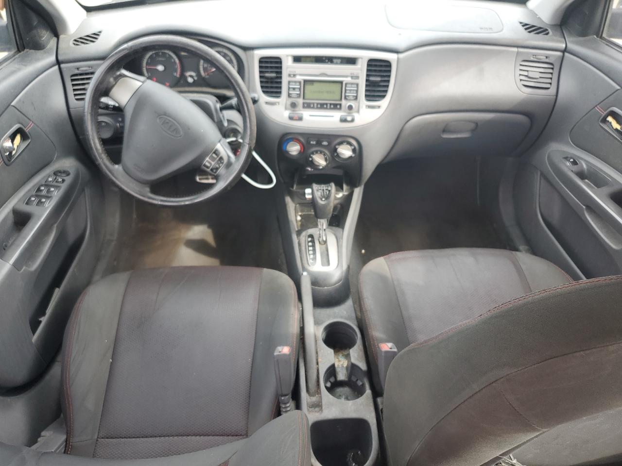 2009 Kia Rio Base VIN: KNADE223296574855 Lot: 81756585