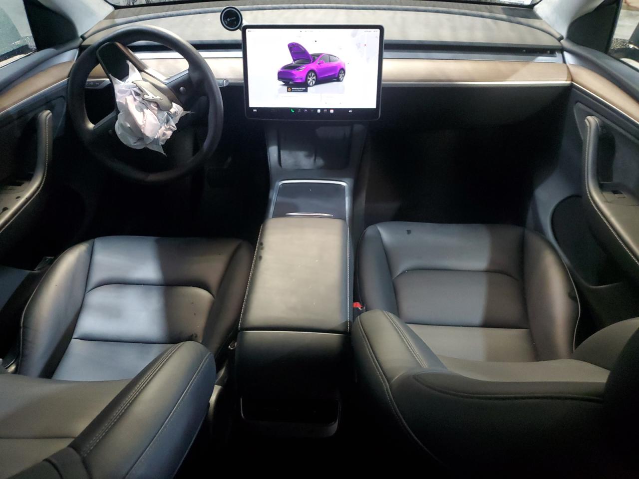 2023 Tesla Model Y VIN: 7SAYGDEE8PA140884 Lot: 83807345