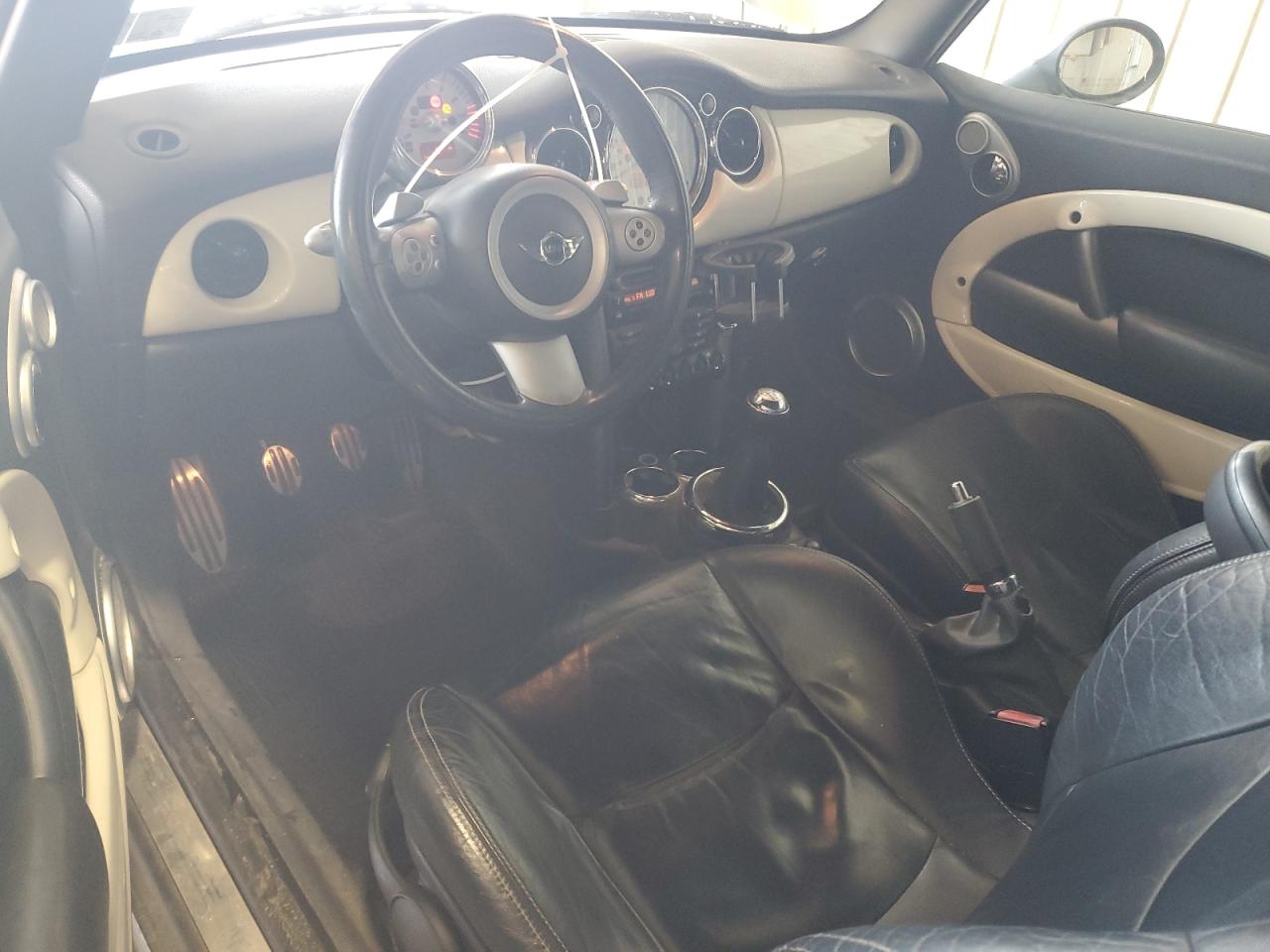 2007 Mini Cooper S VIN: WMWRH33557TL95677 Lot: 70437875