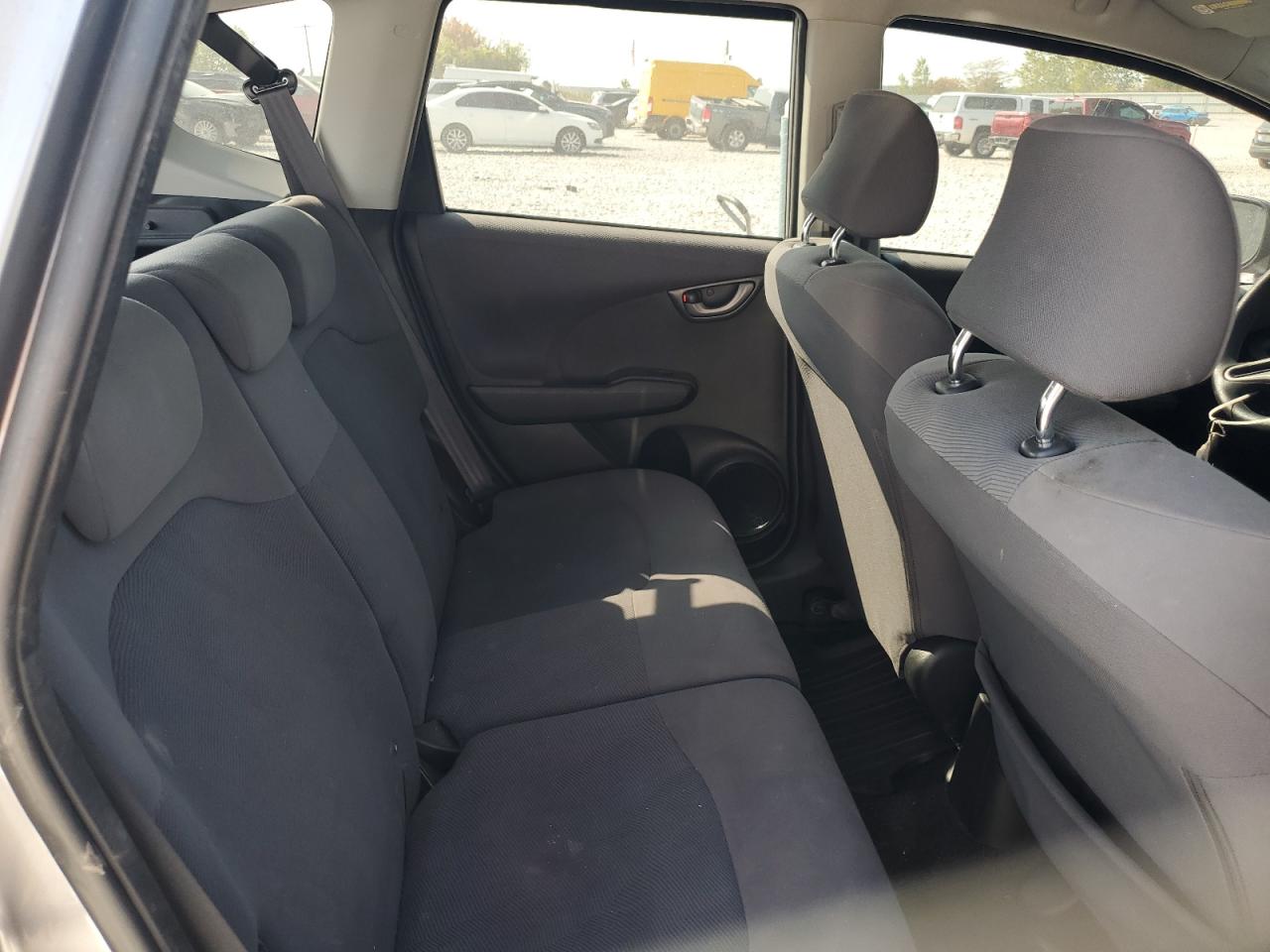 2009 Honda Fit VIN: JHMGE87229S050209 Lot: 80792155