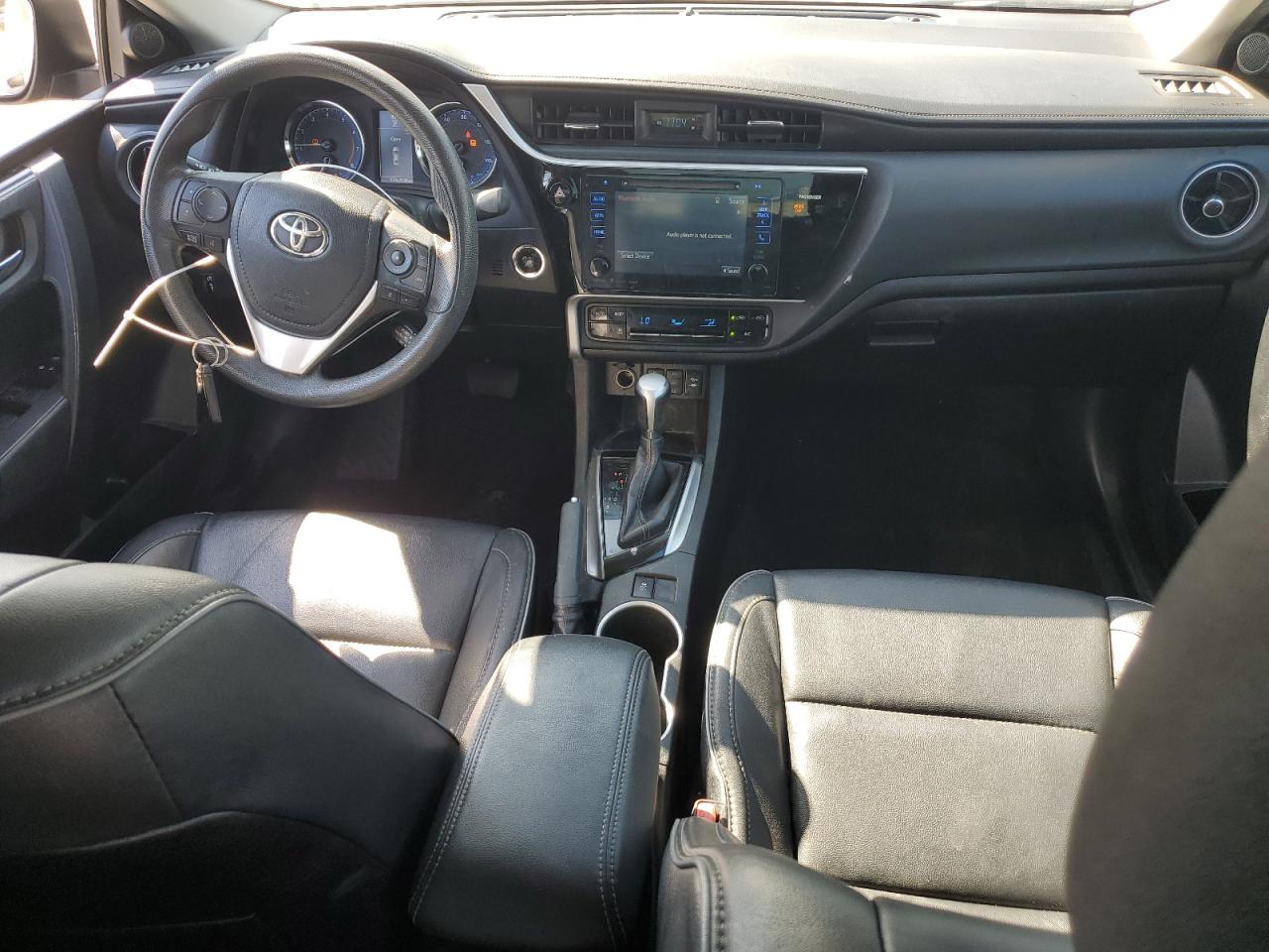 2017 Toyota Corolla L VIN: 5YFBURHE4HP701496 Lot: 82094275