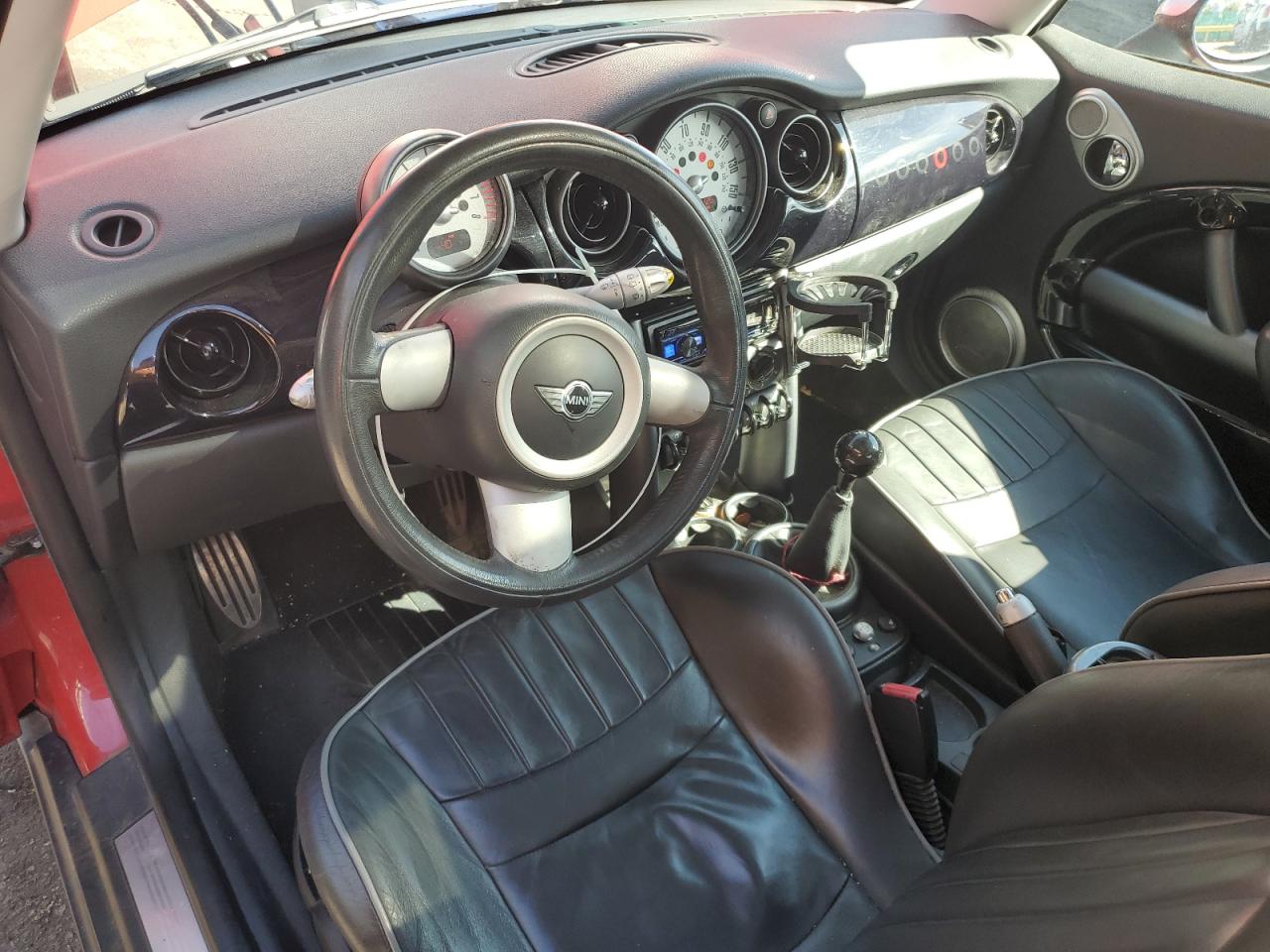 2006 Mini Cooper S VIN: WMWRE33506TL19789 Lot: 84004025