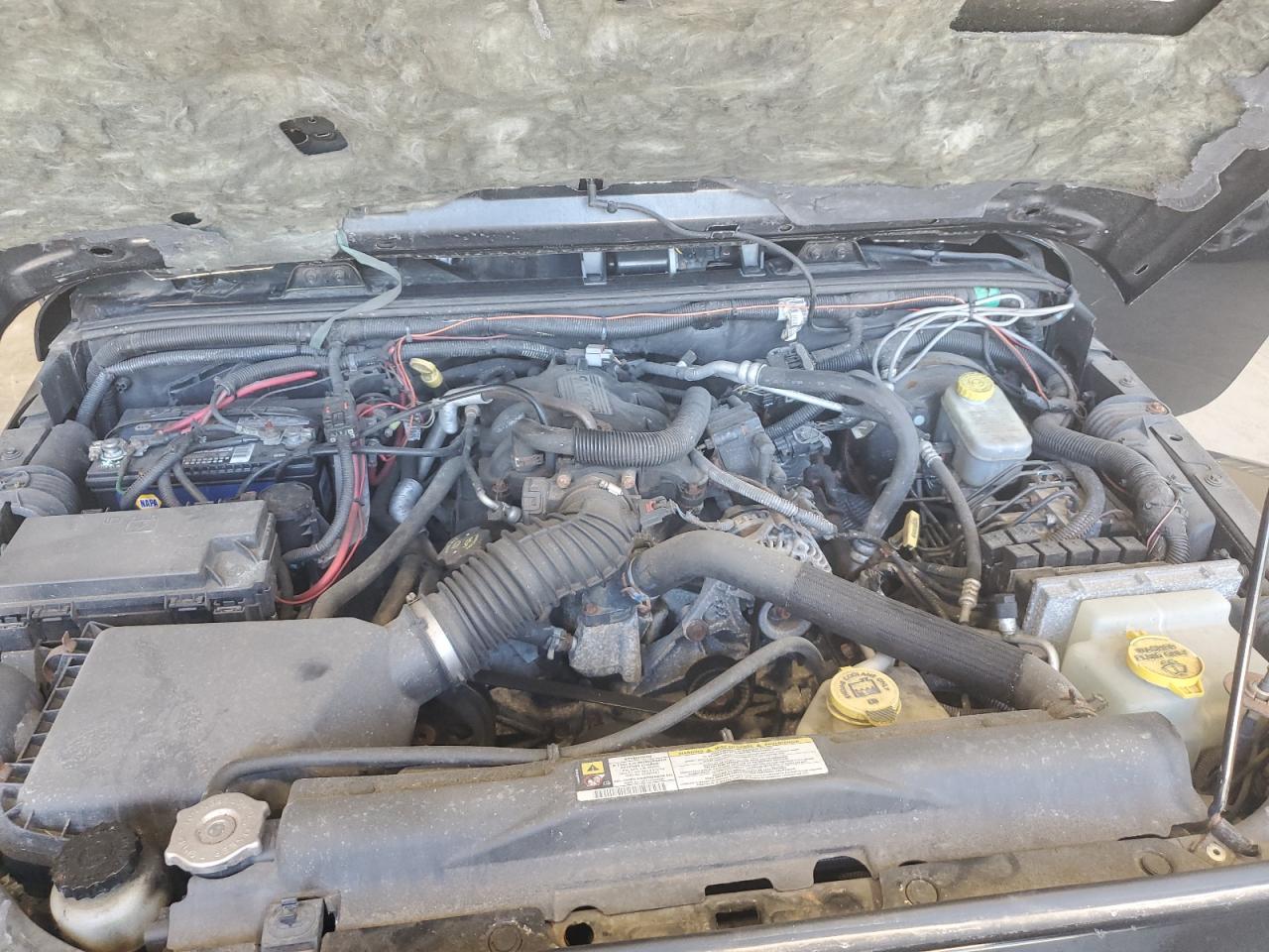 2009 Jeep Wrangler Sahara VIN: 1J8FA541X9L715587 Lot: 70871185