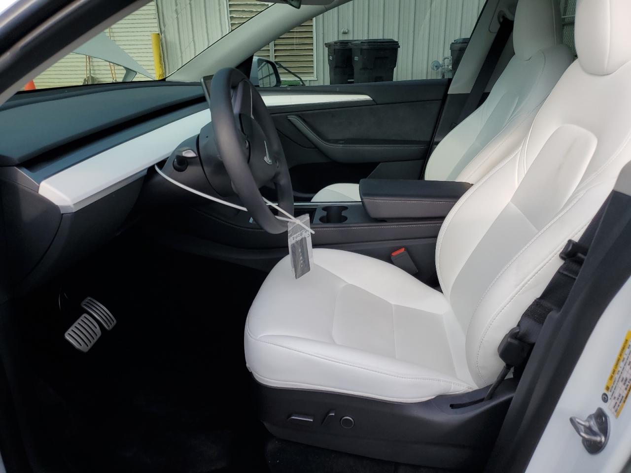 2023 Tesla Model Y VIN: 7SAYGDEF1PF705018 Lot: 82044395