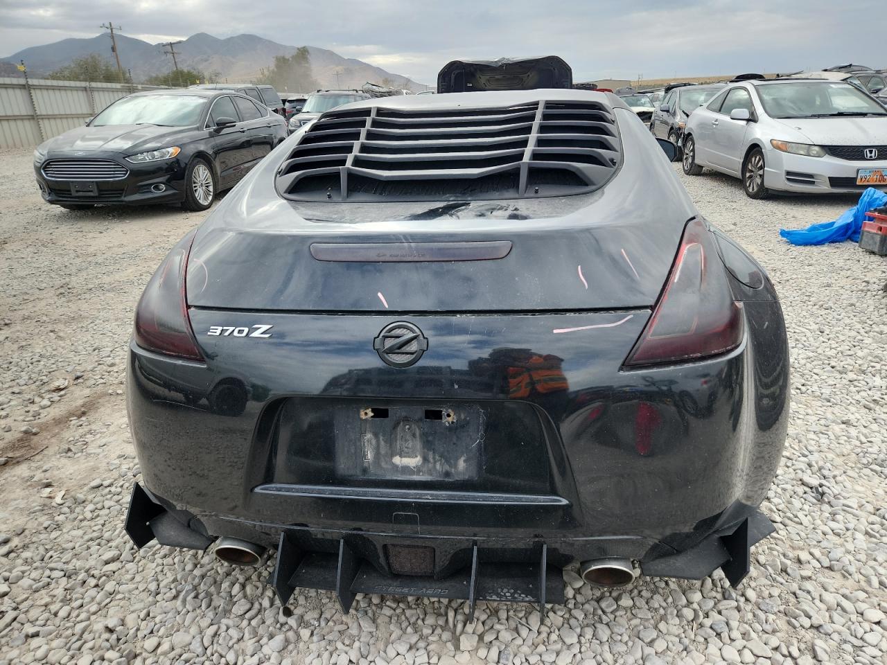 2009 Nissan 370Z VIN: JN1AZ44E39M406760 Lot: 81314905