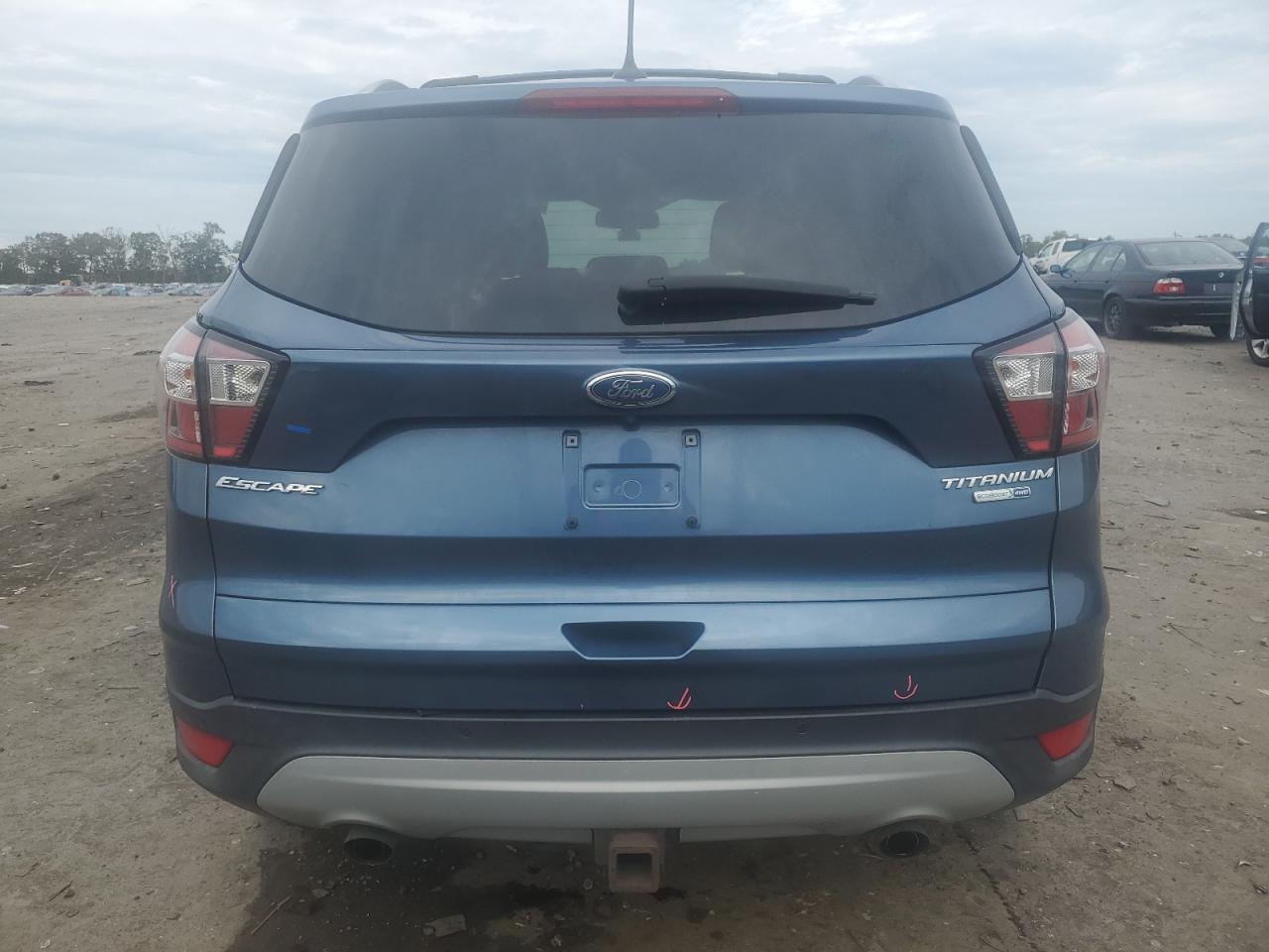 2018 Ford Escape Titanium VIN: 1FMCU9J97JUA79773 Lot: 82081425