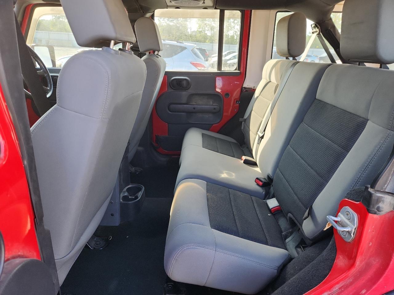 2009 Jeep Wrangler Unlimited X VIN: 1J4GZ39169L720393 Lot: 71303525