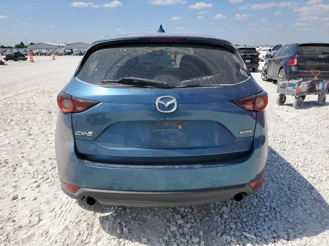 2018 Mazda Cx-5 Touring VIN: JM3KFACM1J1402818 Lot: 84277835