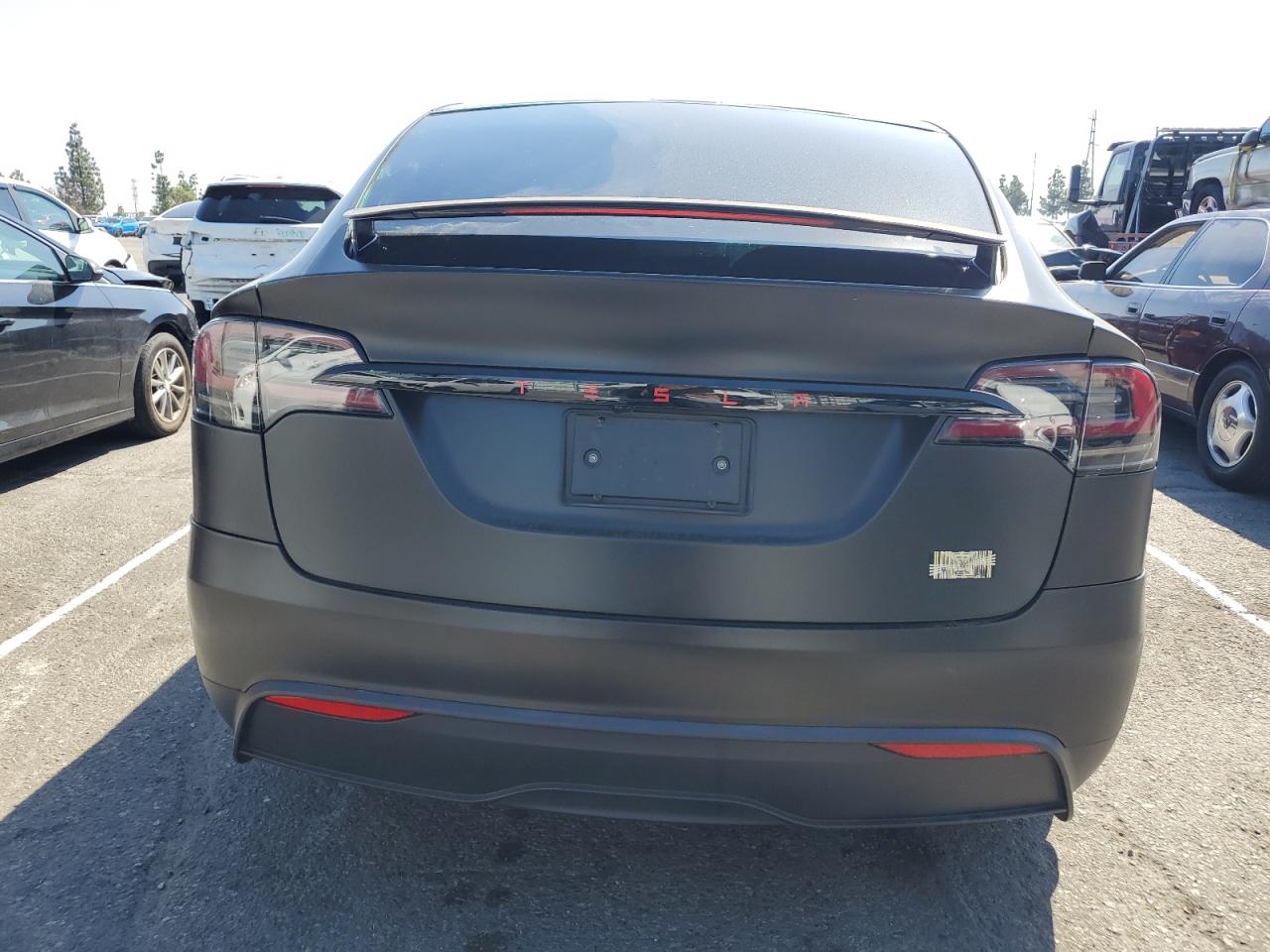 2023 Tesla Model X VIN: 7SAXCBE66PF428457 Lot: 84607835