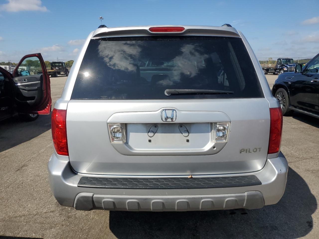 2003 Honda Pilot Exl VIN: 2HKYF18613H571343 Lot: 81700475
