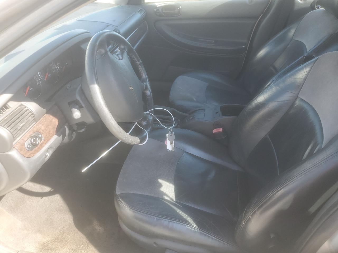 2004 Chrysler Sebring Limited VIN: 1C3EL66R04N218734 Lot: 84277505