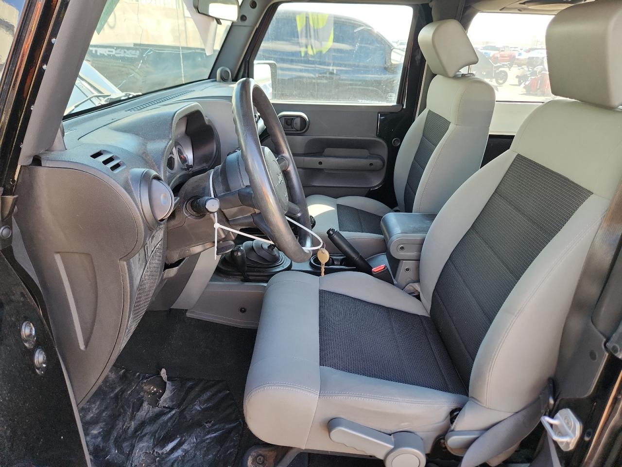 2010 Jeep Wrangler Sport VIN: 1J4AA2D15AL208272 Lot: 80333675