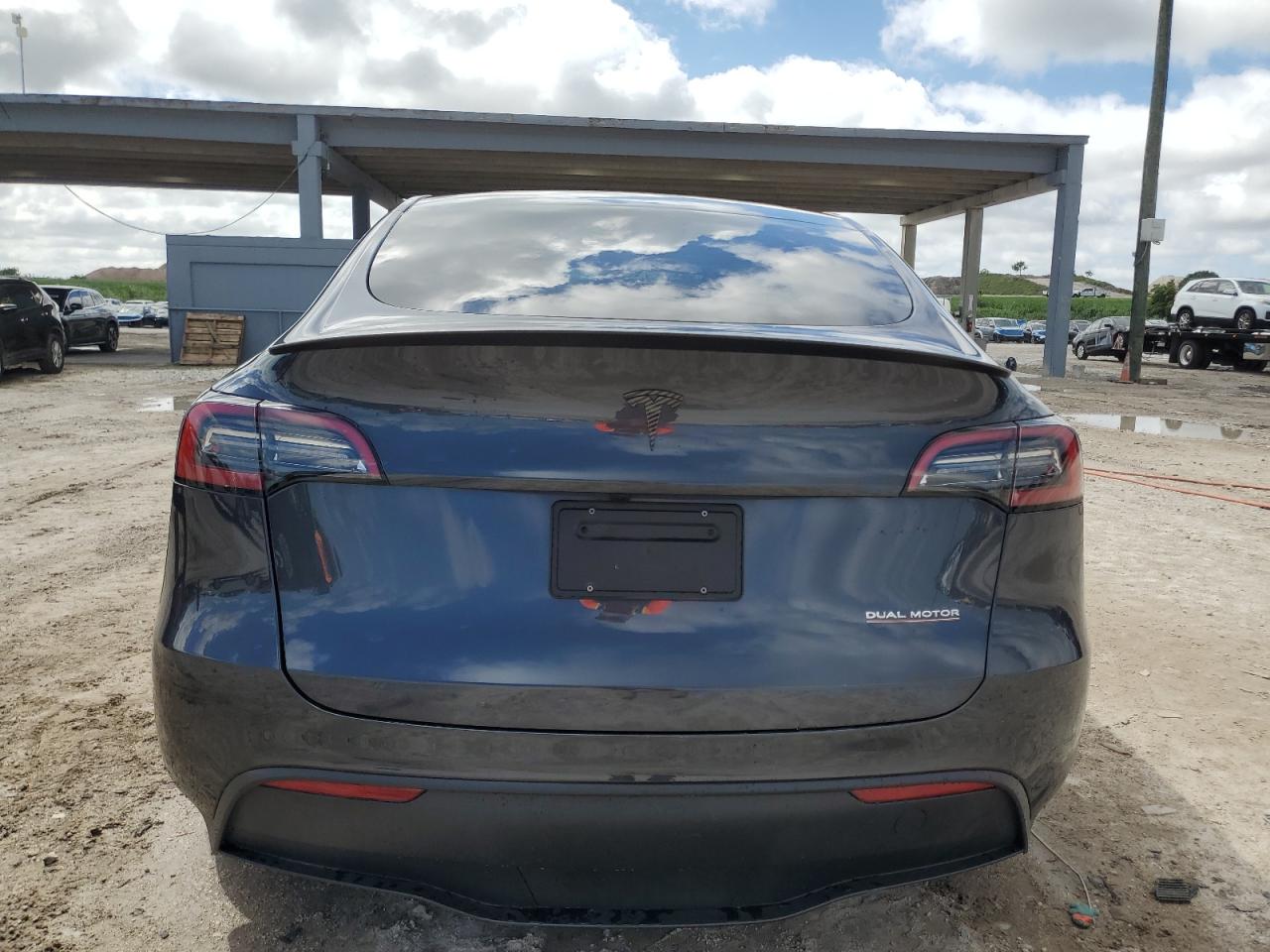 2024 Tesla Model Y VIN: 7SAYGDEF4RA286873 Lot: 84730145