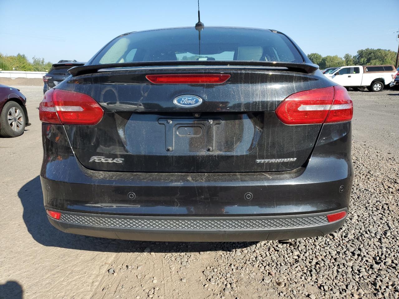 2015 Ford Focus Titanium VIN: 1FADP3J20FL315358 Lot: 81679805