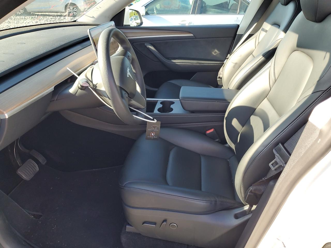 2023 Tesla Model Y VIN: 7SAYGDEE8PA069461 Lot: 82057605