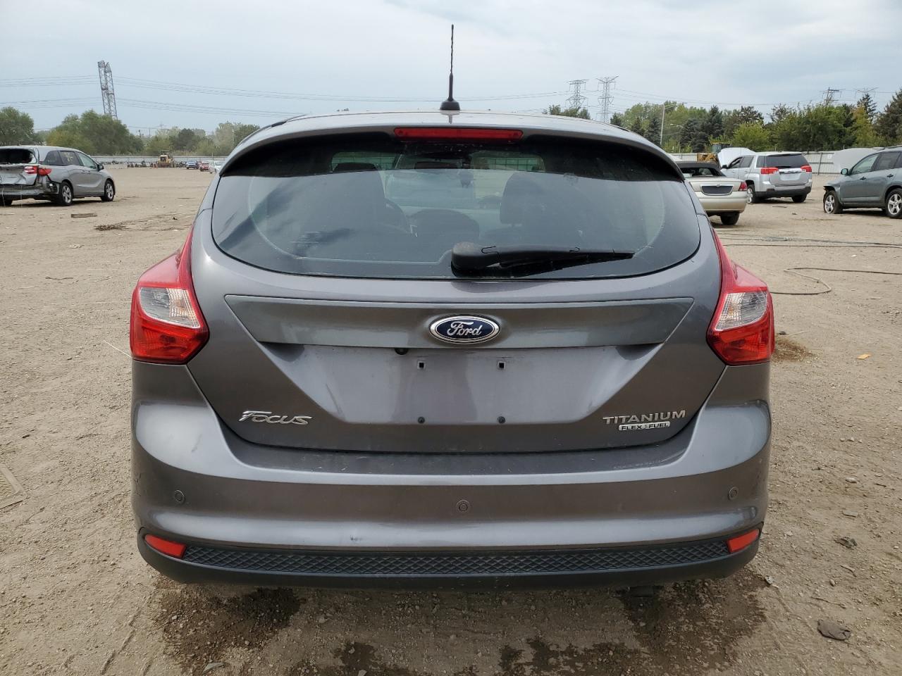 2013 Ford Focus Titanium VIN: 1FADP3N22DL231906 Lot: 81408625