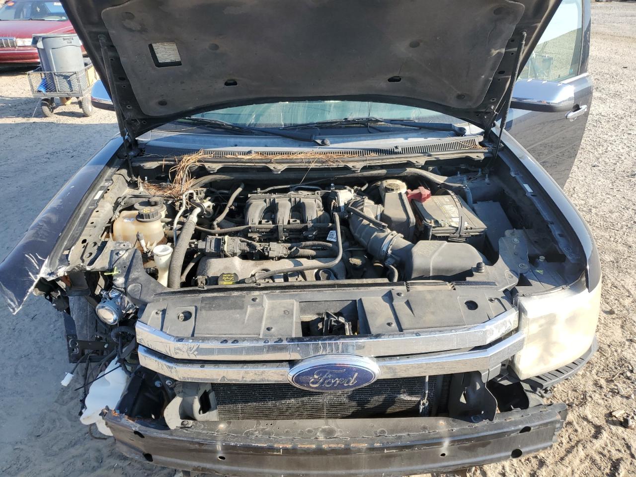 2009 Ford Flex Limited VIN: 2FMEK63C39BB07074 Lot: 80897415