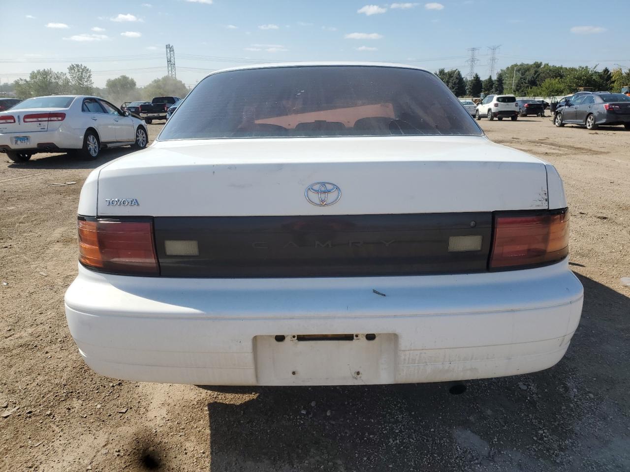 1992 Toyota Camry Dlx VIN: 4T1SK11E1NU047794 Lot: 71488335