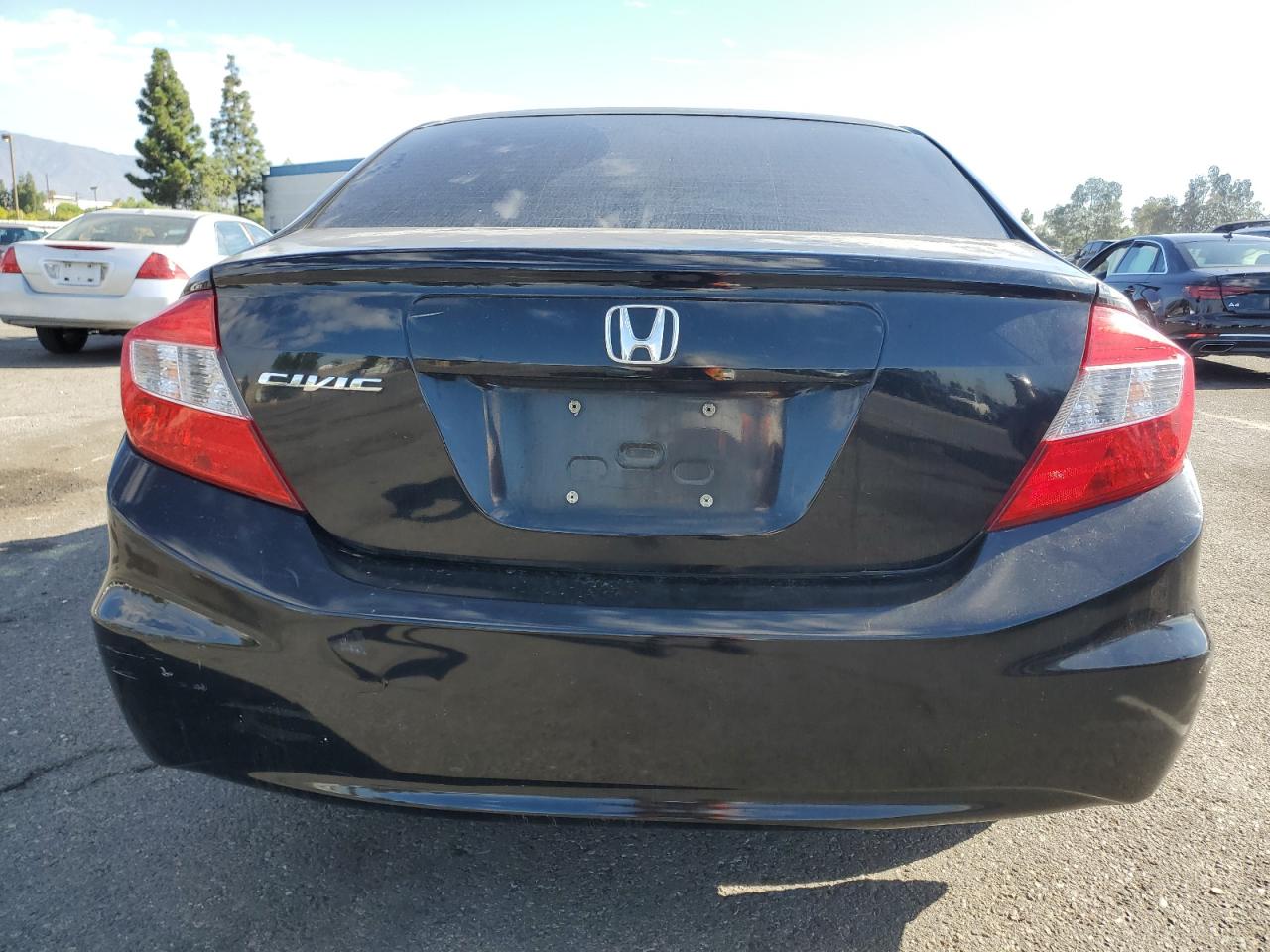 2012 Honda Civic Lx VIN: JHMFB2F51CS005587 Lot: 83834045