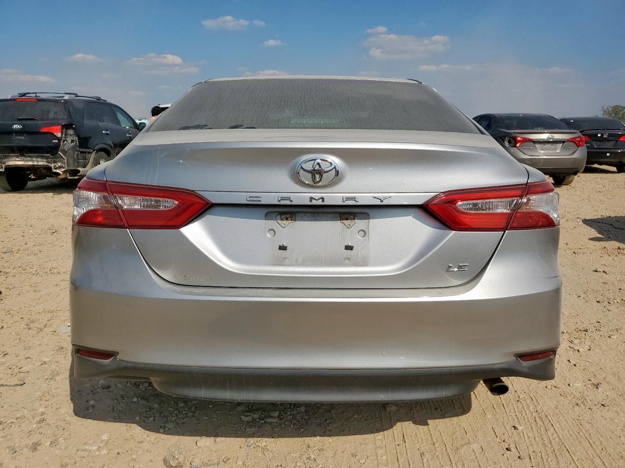 2018 Toyota Camry L VIN: 4T1B11HK1JU631377 Lot: 82176575