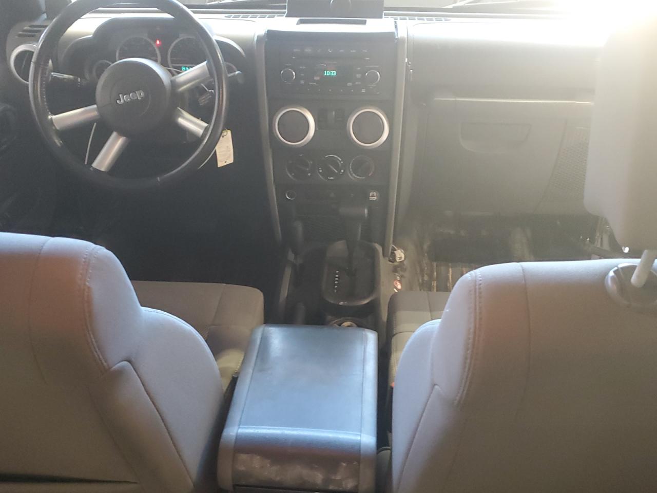 2009 Jeep Wrangler Sahara VIN: 1J8FA541X9L715587 Lot: 70871185