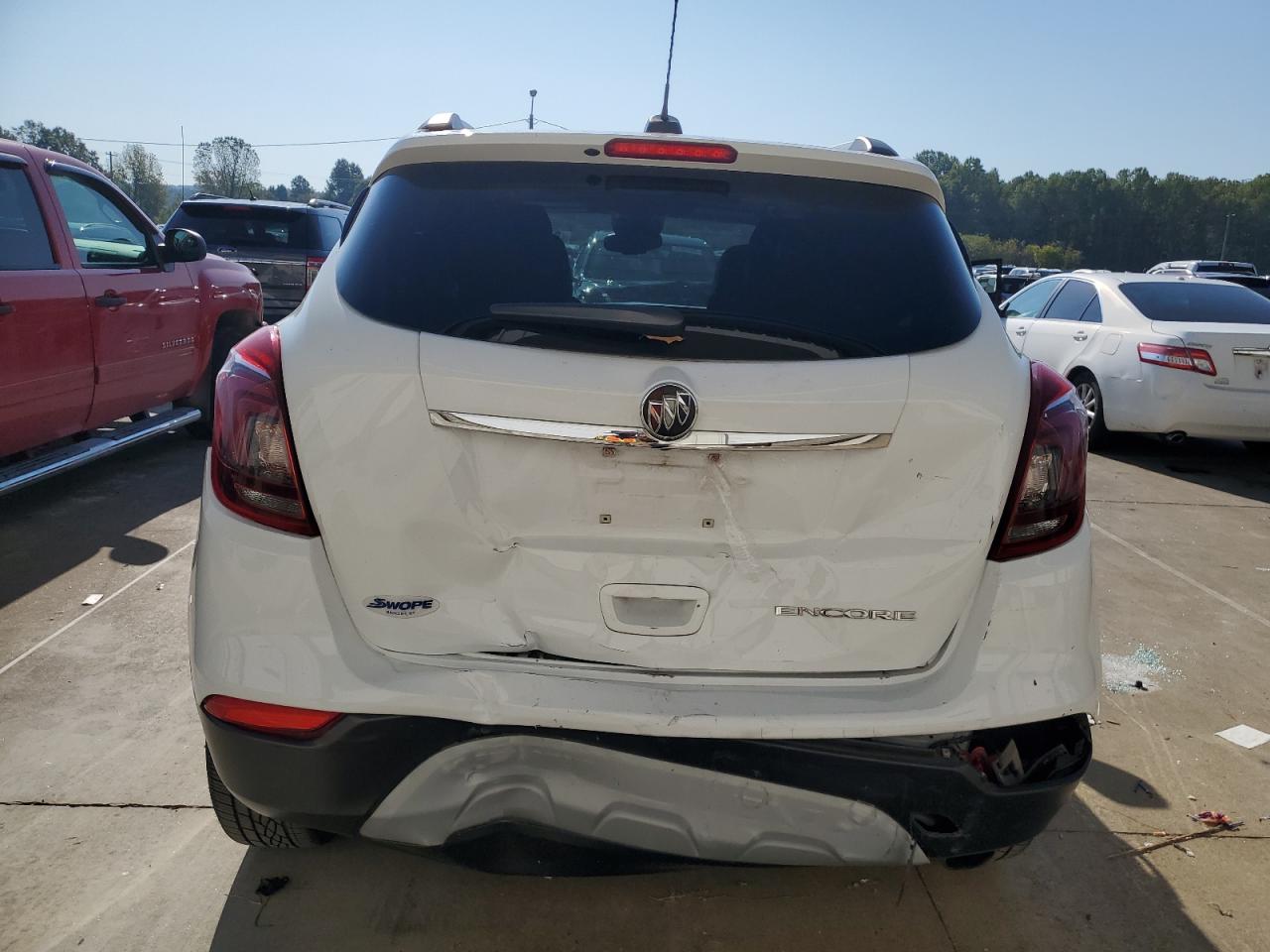 2019 Buick Encore Essence VIN: KL4CJCSM5KB886622 Lot: 84466265