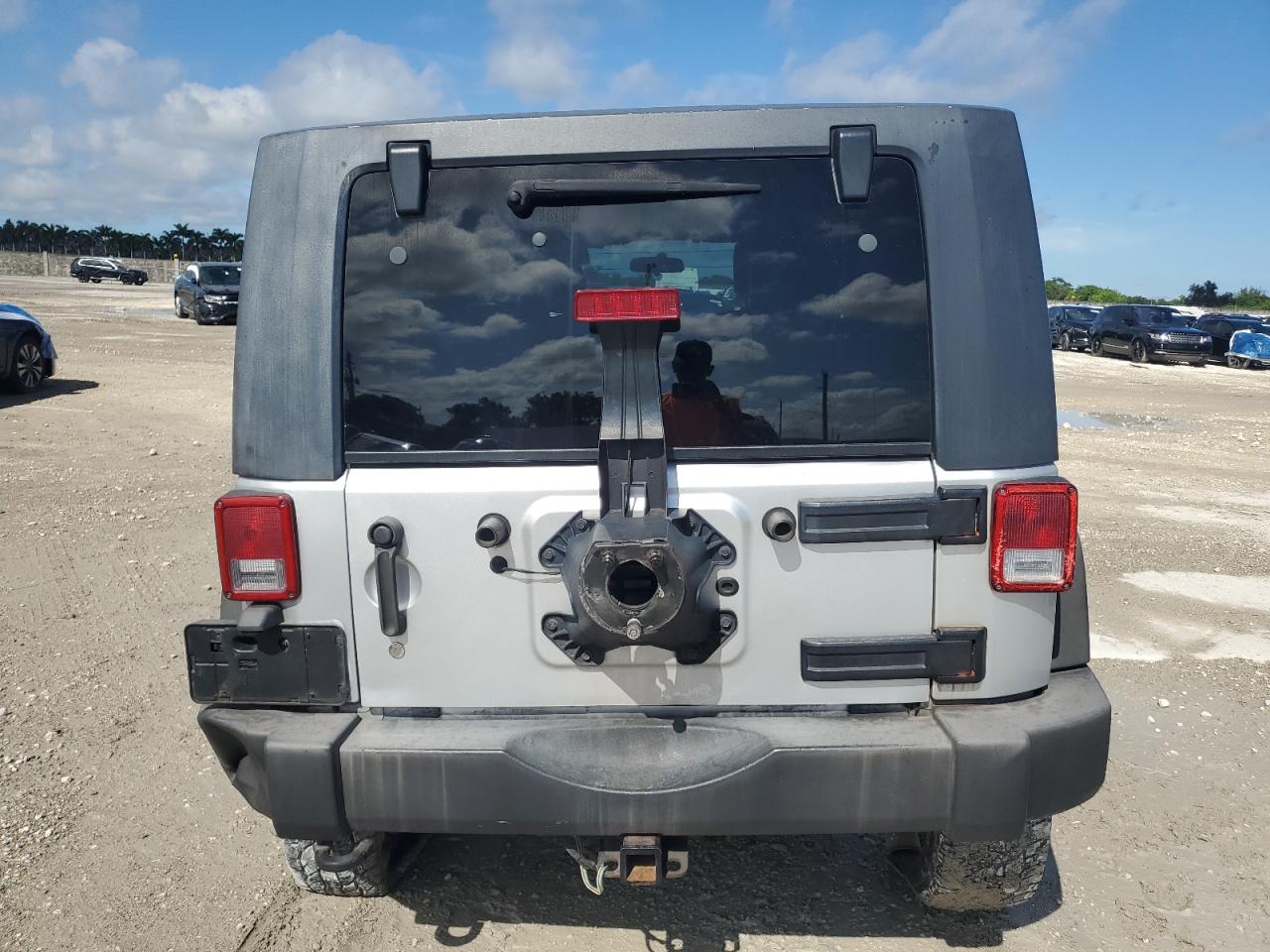 2010 Jeep Wrangler Unlimited Sport VIN: 1J4BB3H15AL134630 Lot: 70052365