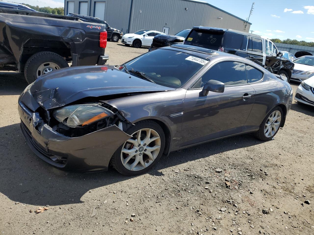 HYUNDAI TIBURON 2008. Lot# 71844705. VIN KMHHN66F78U286058. Photo 1