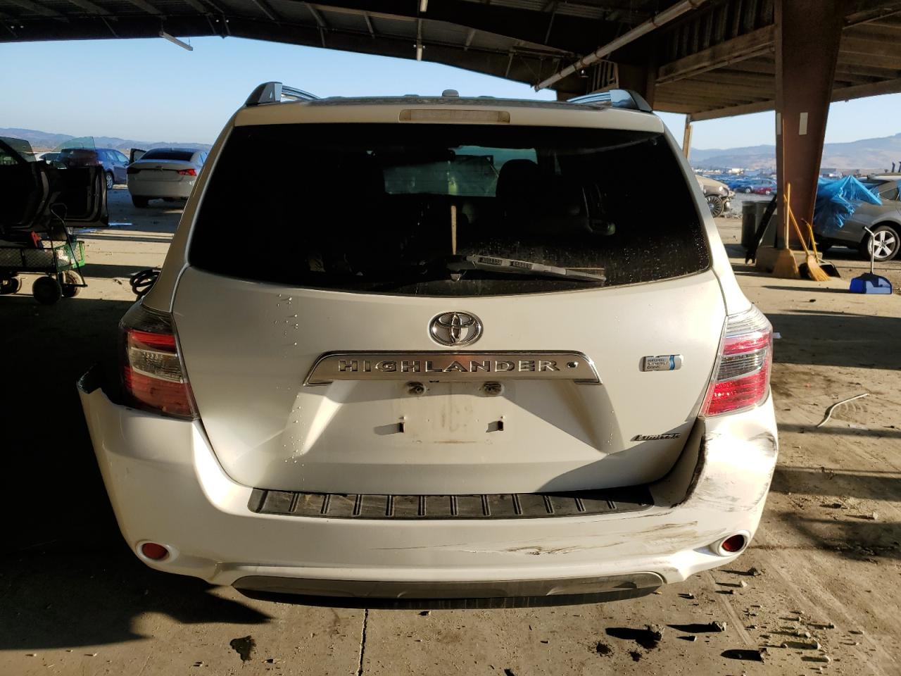 2010 Toyota Highlander Hybrid Limited VIN: JTEJW3EHXA2047671 Lot: 83757775