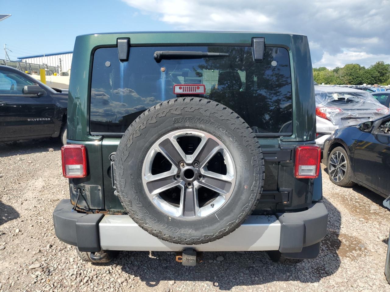 2011 Jeep Wrangler Sahara VIN: 1J4AA5D11BL638030 Lot: 71621375