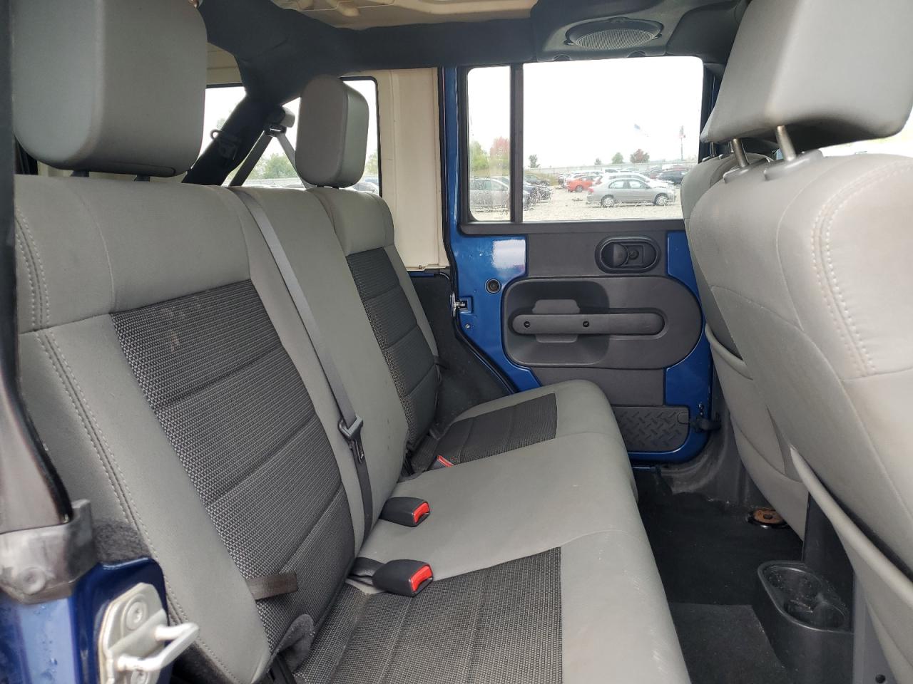 2010 Jeep Wrangler Unlimited Sahara VIN: 1J4BA5H19AL115464 Lot: 81629775