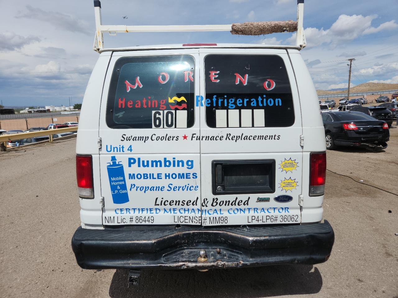 2009 Ford Econoline E150 Van VIN: 1FTNE14W09DA17897 Lot: 80556335